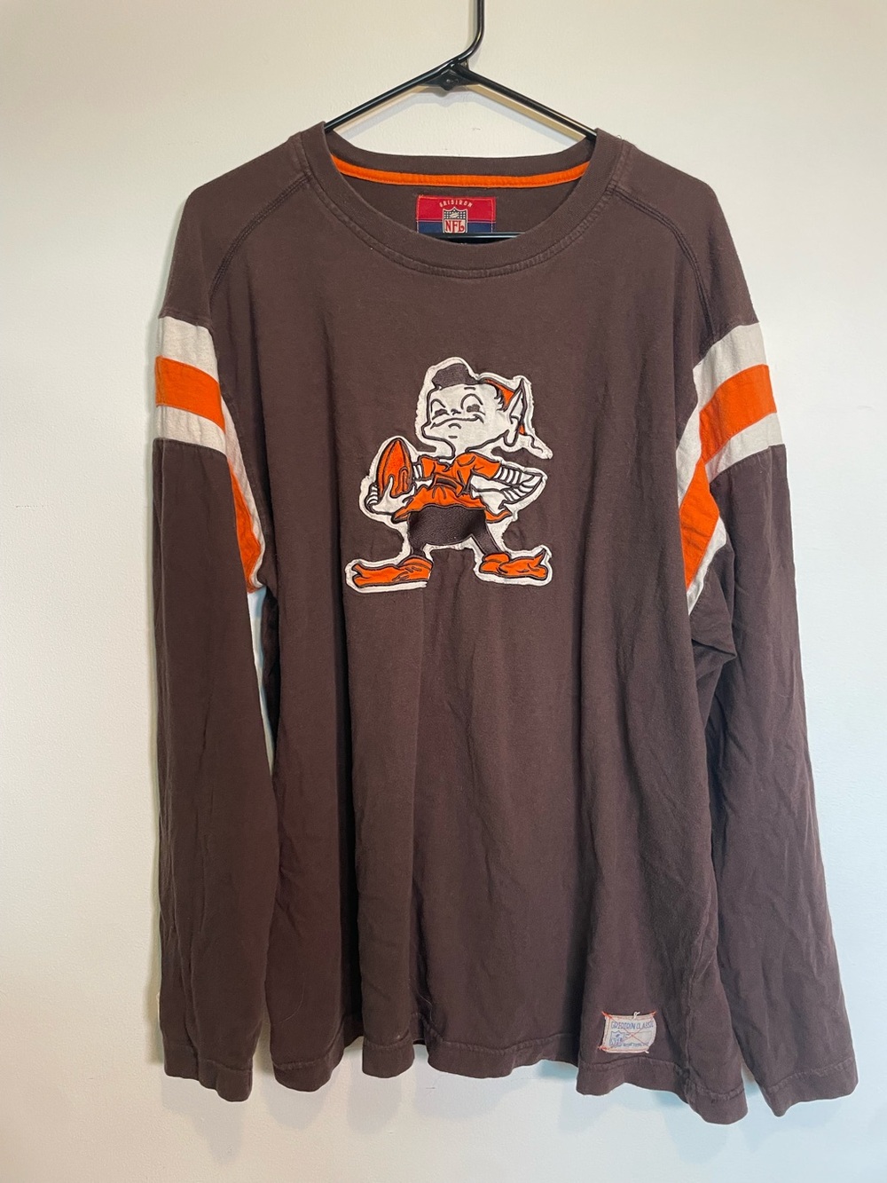 Reebok Cleveland Browns long-sleeve t-shirt in brown with Brownie the Elf